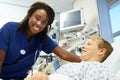 Boy Talking To Female Nurse In Emergency Room Royalty Free Stock Photo