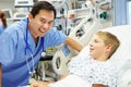 Boy Talking To Male Nurse In Emergency Room Royalty Free Stock Photo
