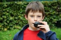 Boy talks on  walkie talkie Royalty Free Stock Photo