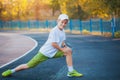 Boy Teen doing sports exercises on a stadium Royalty Free Stock Photo