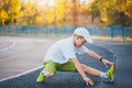 Boy Teen doing sports exercises on a stadium Royalty Free Stock Photo