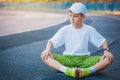 Boy Teen doing sports exercises on a stadium Royalty Free Stock Photo