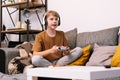 Boy teenager playing video game with joystick Royalty Free Stock Photo