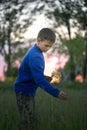 Boy teenager on a red sunset background. Royalty Free Stock Photo