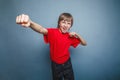 Boy, teenager, twelve his years red in shirt Royalty Free Stock Photo