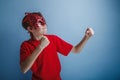 Boy teenager twelve years in red shirt in the Royalty Free Stock Photo