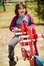 Boy on teeterboard Royalty Free Stock Photo