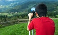 Boy and telescope