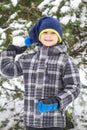 Boy throw snowball. Wintertime fun Royalty Free Stock Photo