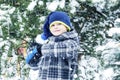 Boy throw snowball. Wintertime fun Royalty Free Stock Photo