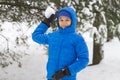 Boy throw snowball. Wintertime fun Royalty Free Stock Photo