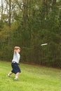 Boy throwing frisbee