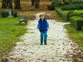 Boy throwing pebbles