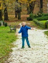 Boy throwing pebbles