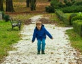 Boy throwing pebbles