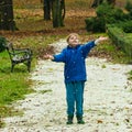 Boy throwing pebbles