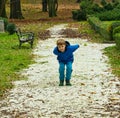 Boy throwing pebbles