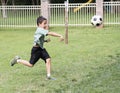 Boy throwing a soccer boy Royalty Free Stock Photo