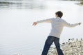 Boy Throwing Stones Royalty Free Stock Photo