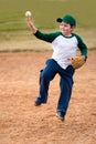 Boy throws baseball Royalty Free Stock Photo