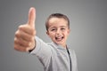 Boy with thumbs up agreeing Royalty Free Stock Photo