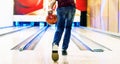 Boy about to roll a bowling ball hobby and leisure concept Royalty Free Stock Photo