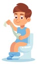 Boy in toilet. Cute little child sitting on potty with paper roll in hand, home lavatory pan, kid every day routine Royalty Free Stock Photo