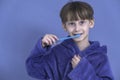 the boy with the toothbrush. Health care, dental hygiene. Little boy cleaning teeth.
