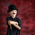 Boy with top hat mustache