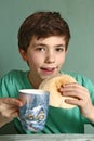 Boy with tortillia and milk