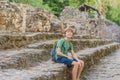 Boy tourist at Coba, Mexico. Ancient mayan city in Mexico. Coba is an archaeological area and a famous landmark of