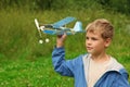 Boy with toy airplane in hands Royalty Free Stock Photo