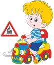 Boy on a toy train