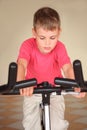 Boy on training apparatus