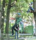 Boy trains in rope park