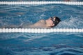 The boy trains in swimming pool, before the compet Royalty Free Stock Photo