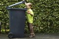 Boy Trashing A Can Royalty Free Stock Photo