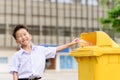 Boy trow the garbage Royalty Free Stock Photo