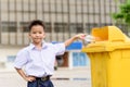 Boy trow the garbage Royalty Free Stock Photo