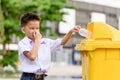 Boy trow the garbage Royalty Free Stock Photo