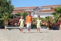 Boy and two girls walking on beach Royalty Free Stock Photo