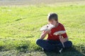 Boy with two parasol mushrooms