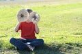 Boy with two parasol mushrooms