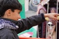 boy with typical fallas scarf watching the fallas monuments in valencia Royalty Free Stock Photo