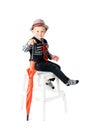 Boy with umbrella studio shot isolated on a white background Royalty Free Stock Photo