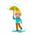 Boy Under Raindrops With Umbrella , Kid In Autumn Clothes In Fall Season Enjoyingn Rain And Rainy Weather, Splashes And Royalty Free Stock Photo