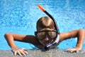 Baby boy in the water mask in the pool. Child swimmer in the water autdoor. Royalty Free Stock Photo