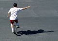 Boy on a unicycle Royalty Free Stock Photo
