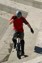 Boy on unicycle Royalty Free Stock Photo