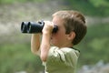 Boy Using Binoculars Royalty Free Stock Photo